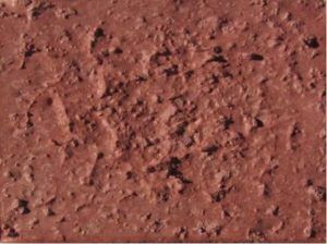 colorante rojo con cemento gris